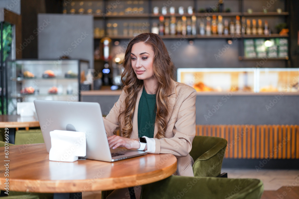 Business Woman Restaurant Owner Use Laptop Dressed Elegant Pantsuit Sitting In Restaurant 