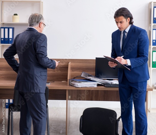 Two experts criminologists working in the office © Elnur