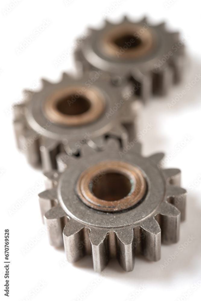 angle view gears on a white background at vertical composition angle view gears on a white background at vertical composition