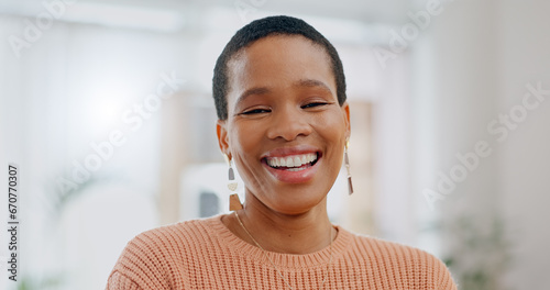 Happy, black woman and portrait in a house with confidence and smile in a living room. New house, excited and funny joke with a relax African female person from Ghana in a lounge at morning with joy