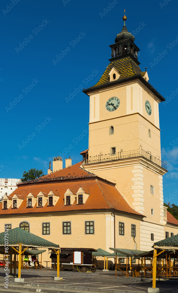 Brasov Town Hall on main Council Square in sunny autumn day, Romania