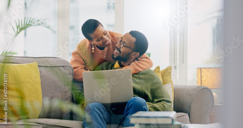 Laptop, love and black couple hug, smile and happy for home romance, partner support or marriage news. Care, lounge sofa and African man, woman or people embrace for online relationship test results