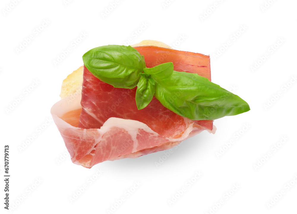 Tasty sandwich with cured ham and basil leaves isolated on white, top view Tasty sandwich with cured ham and basil leaves isolated on white, top view