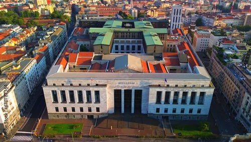 Aerial view of the Central Supreme Court building
Tribunale Ordinario. City skyline at sunset. Architecture of municipal buildings. Justice. Place of work of lawyers. Milan Italy 10.11.2023 photo