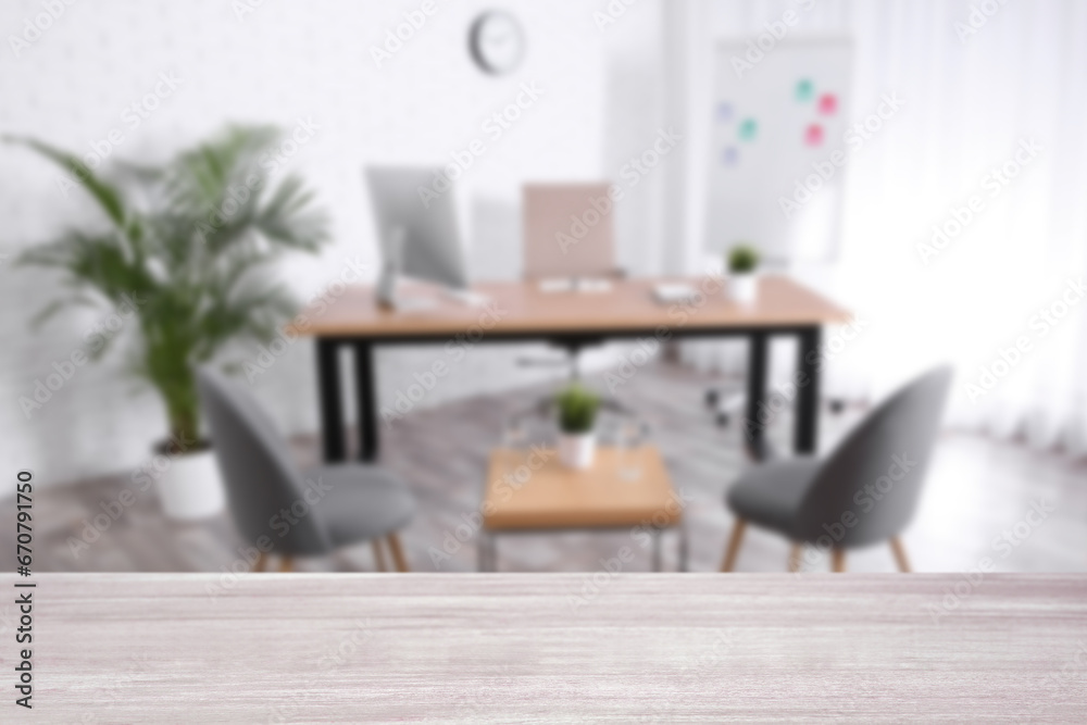 Empty wooden table in comfortable office. Space for design Empty wooden table in comfortable office. Space for design