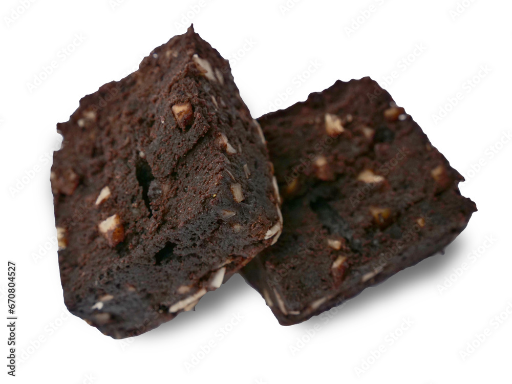 Pieces of fresh delicious chocolate and almond nut brownies, cut out isolated on white Pieces of fresh delicious chocolate and almond nut brownies, cut out isolated on white