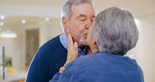 Care, love or old couple kiss in home to relax for connection, support, bond for trust or comfort. Elderly people in marriage, house or retirement with commitment, affection or romance together