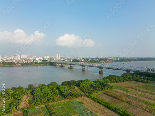 Chuong Duong bridge crossing Red river in Hanoi photo