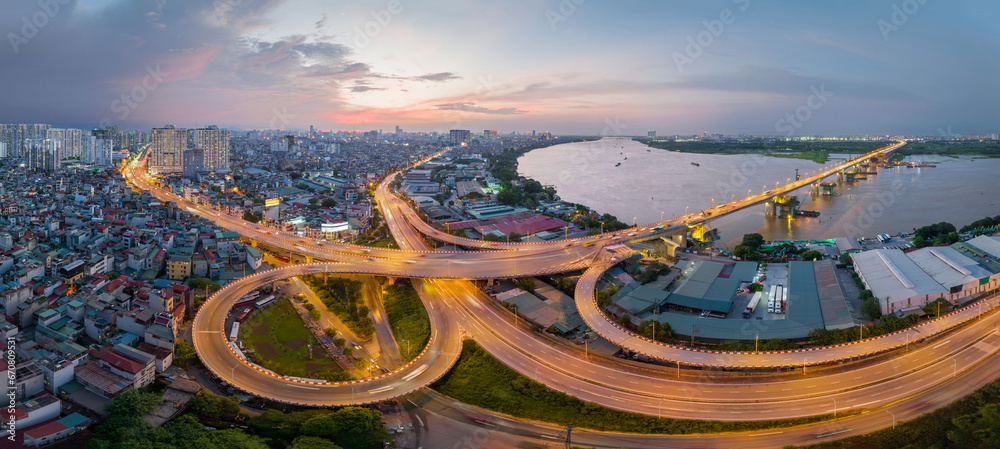 Obraz na płótnie Aerial view of road interchange or highway intersection in Vinh Tuy bridge, Hanoi, Vietnam w salonie