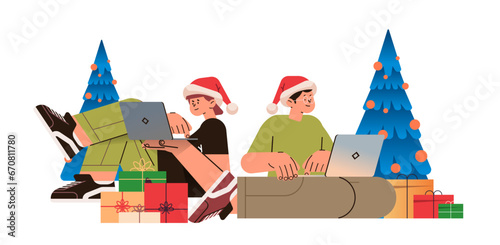 man woman in santa hats near decorated christmas tree using laptops social media communication new year holidays celebration concept