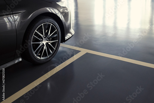 close up of modern car in parking lot, anti slip coating floor for safety