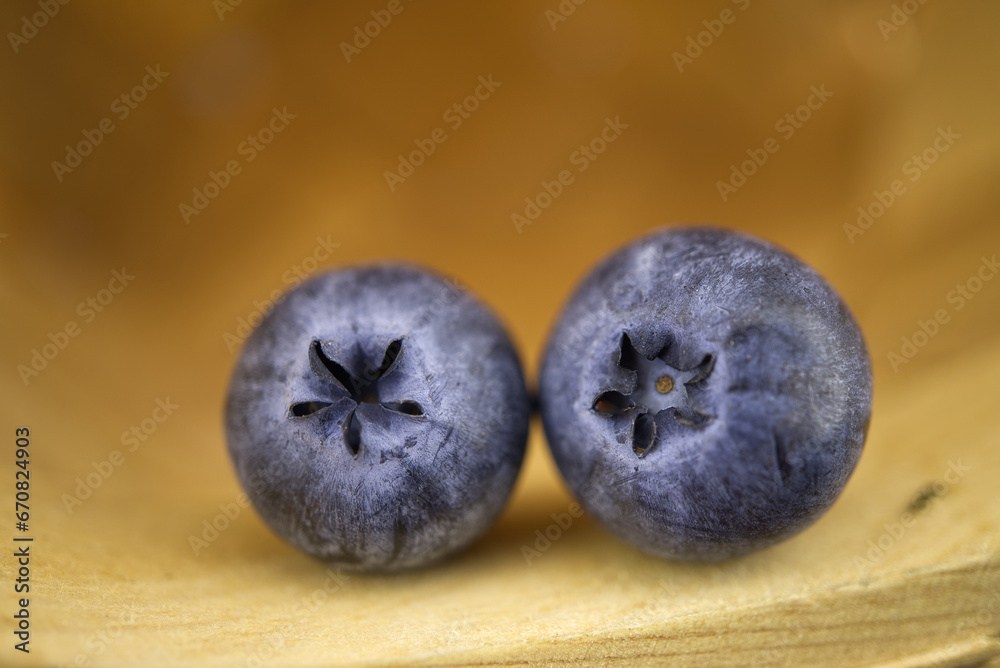 Blueberries in a selective focus view on wooden table Blueberries in a selective focus view on wooden table