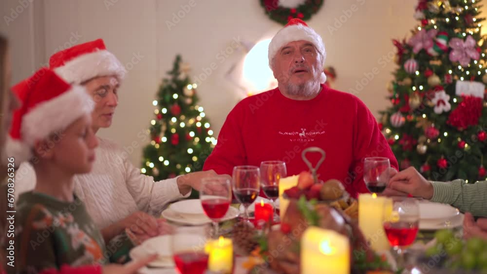 Happy - cheerful caucasian white family enjoy the time to celebrating the Christmas Eve and New Year festival together, caucasian white people family cheers a wine together in Christmas party. Happy - cheerful caucasian white family enjoy the time to celebrating the Christmas Eve and New Year festival together, caucasian white people family cheers a wine together in Christmas party.