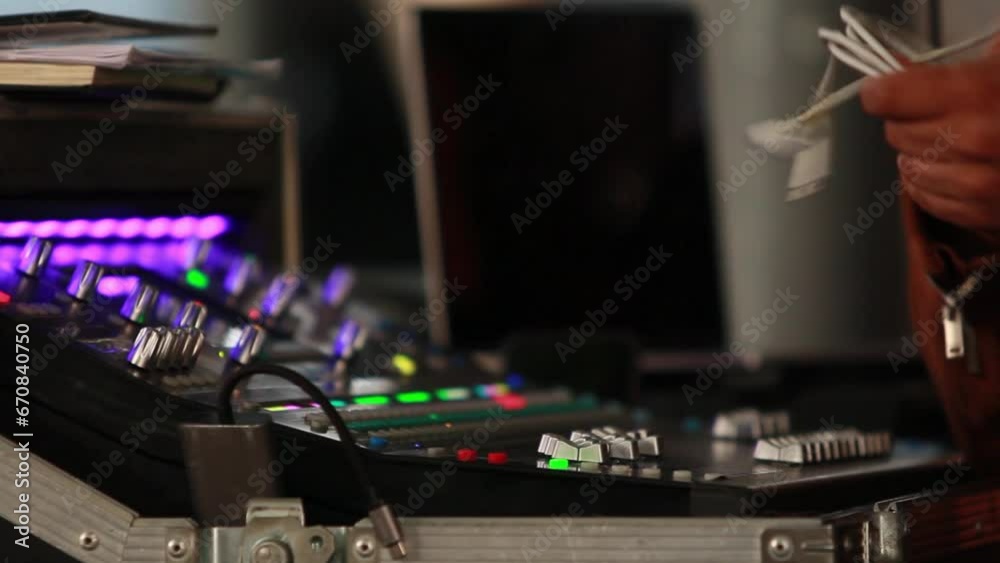 close up, hands of an audio technician untangling audio cable, studio audio mixer, hands of a man with brown skin, hispanic worker close up, hands of an audio technician untangling audio cable, studio audio mixer, hands of a man with brown skin, hispanic worker
