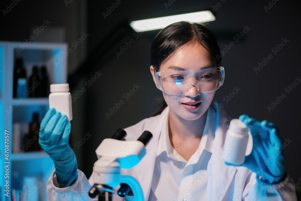 Asian female scientist looking under microscope, analyzes petri dish sample. specialists working on medicine, biotechnology research in advanced pharmacy lab, Medical development laboratory. Asian female scientist looking under microscope, analyzes petri dish sample. specialists working on medicine, biotechnology research in advanced pharmacy lab, Medical development laboratory.