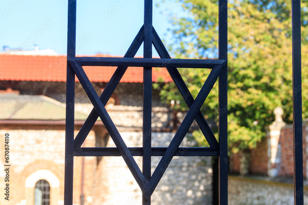 Jewish star of David on the metal fence Jewish star of David on the metal fence