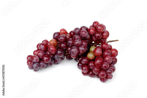 Red grapes (vitis vinifera) isolated on white background.