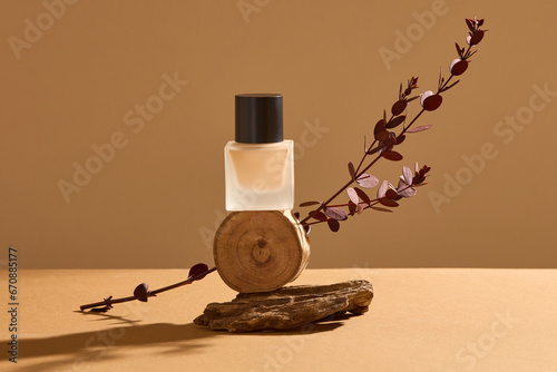 Beauty makeup foundation product decorated against brown background. Promotional advertising images. Empty label for mockup design