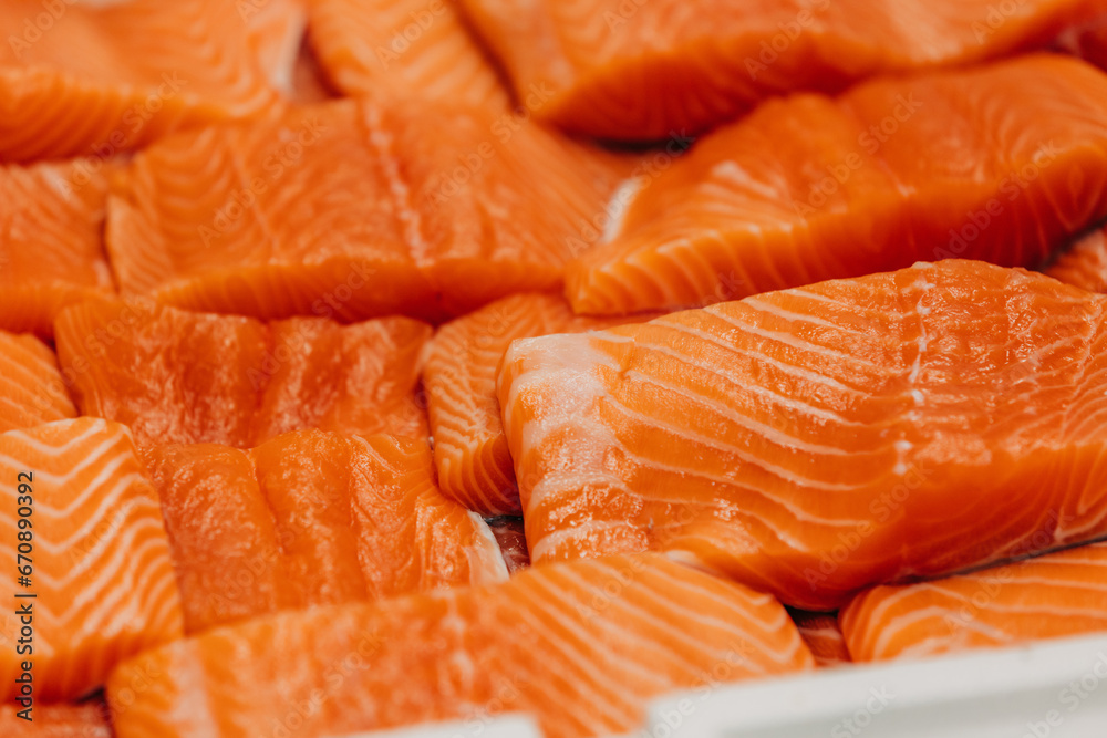 cut and packaged pieces of salmon in a restaurant before cooking cut and packaged pieces of salmon in a restaurant before cooking