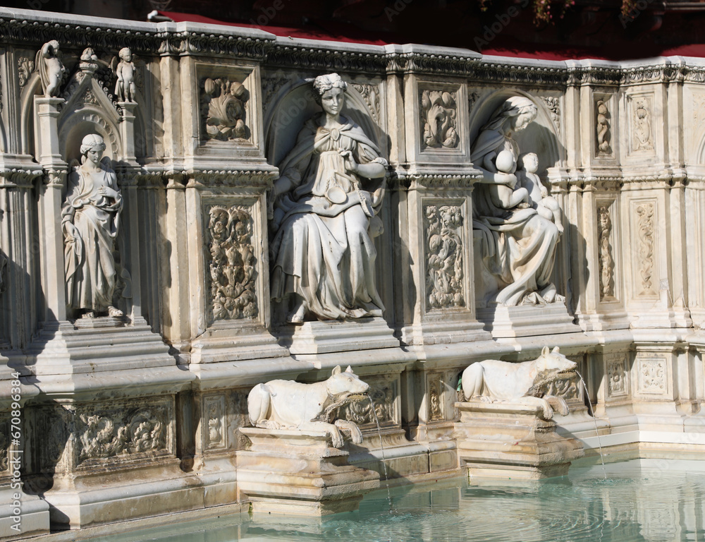 Siena, SI, Italy - February 20, 2023: Detail of Fonte Gaia is a monumental fountain in Piazza del Campo