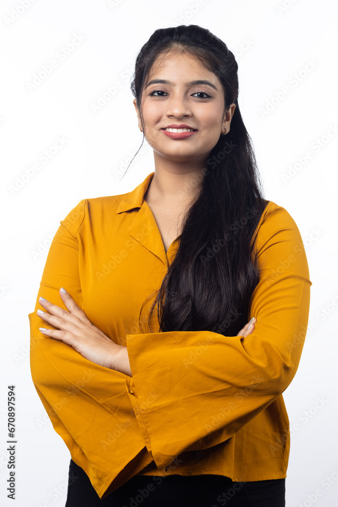 Confident Young Indian, asian business woman, female entrepreneur looking at camera in professional outfit dress isolated on white background Confident Young Indian, asian business woman, female entrepreneur looking at camera in professional outfit dress isolated on white background