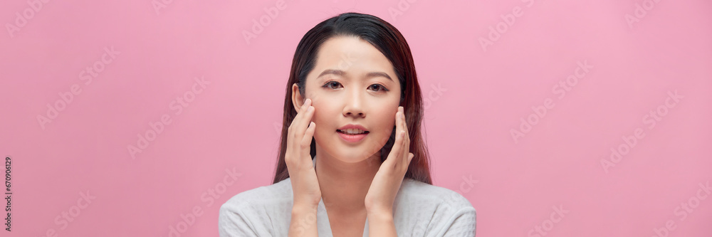 Beautiful spa model girl with perfect fresh clean skin over pink banner. Beautiful spa model girl with perfect fresh clean skin over pink banner.