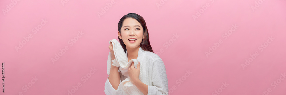 Asian young woman using white towel cleansing face clear fresh dry skin Asian young woman using white towel cleansing face clear fresh dry skin