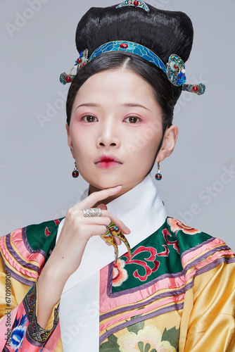 A Chinese beauty dressed in Qing Dynasty court attire