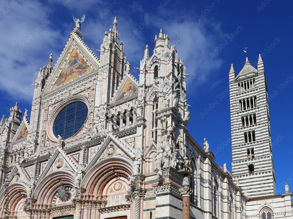 Facade of Cathedral of SIENA in Italy and Bell Tower