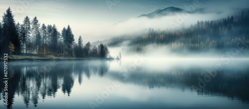 Enigmatic mist above woodland waters © 2rogan