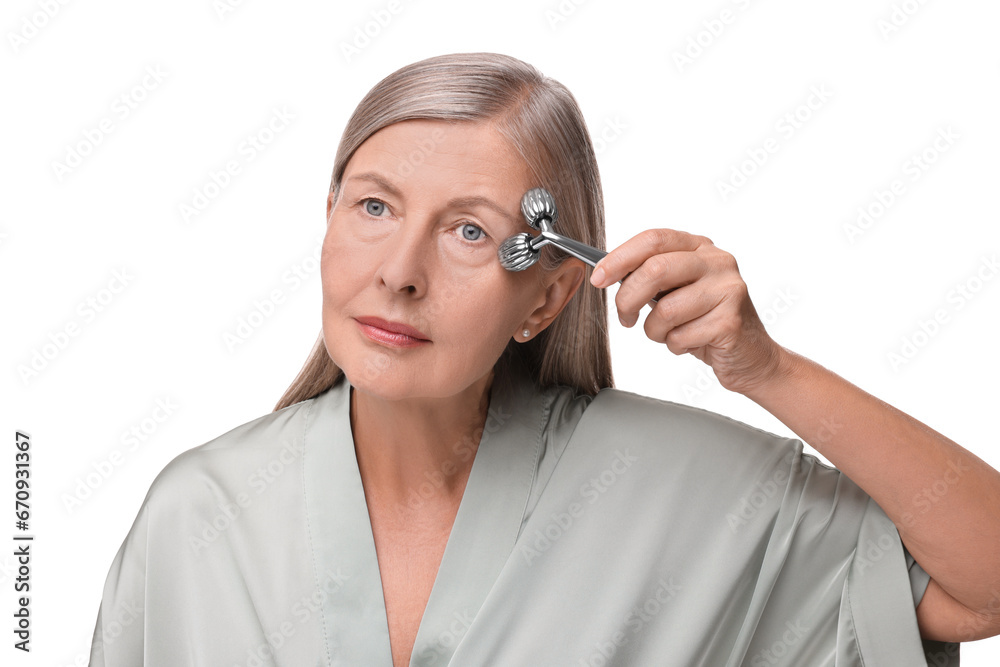 Woman massaging her face with metal roller isolated on white Woman massaging her face with metal roller isolated on white
