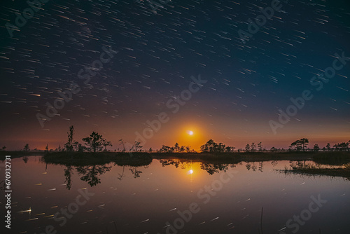 5k . Bright Dramatic Trails Of Stars And Meteors. Stars Effect In Sky. Unusual Dusk Natural Background. Sunset Trace Of Sun Above Rural Landscape. Soft Colors. , .