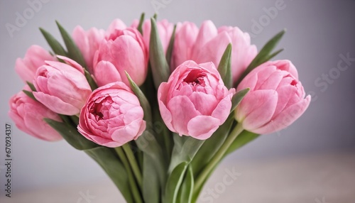 Beautiful pink spring flowers Tulips bouquet on blurry background, delivery for gift concept © prasanth