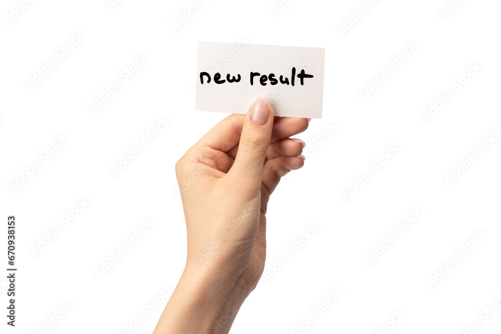 New mindset - new result text on a card in a woman hand. New mindset - new result text on a card in a woman hand.