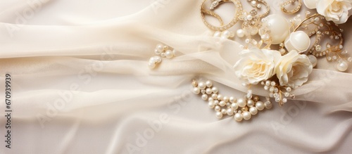 Fabric background adorned with wedding accessories