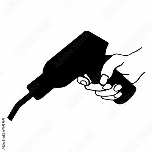 Welding machine in the worker's hand