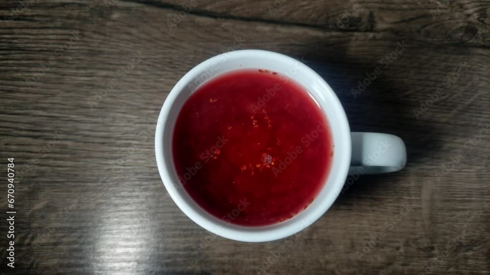 Fruit tea brewed in a mug