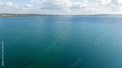 Aerial view of Lake Bracciano  originally also called Lake Sabatino. It is a lake of volcanic and tectonic origin  located in the metropolitan city of Rome and surrounded by the Sabatini Mountains.