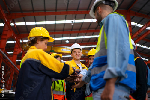 Blue collar worker work at metal sheet factory. © Suney