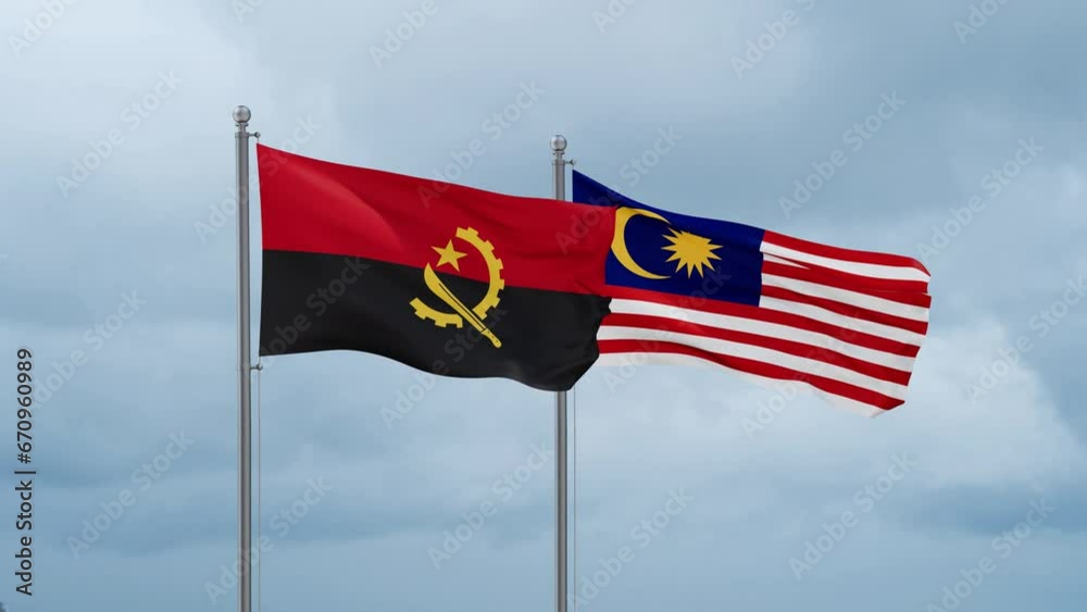 Malaysia and Angola flag waving together on cloudy sky, endless seamless loop, two country cooperation concept Malaysia and Angola flag waving together on cloudy sky, endless seamless loop, two country cooperation concept