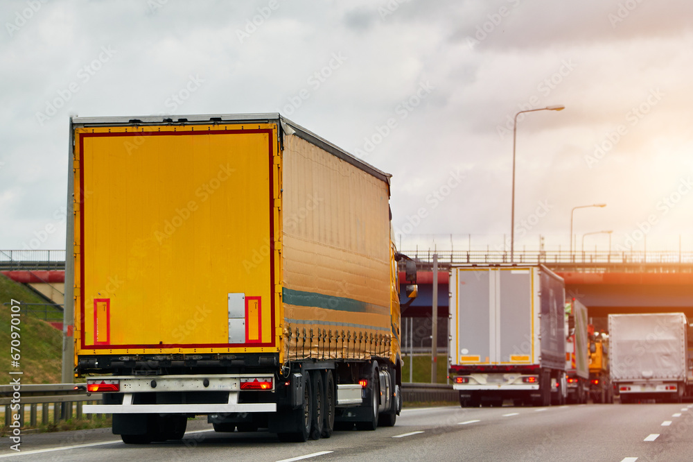 Cargo truck on the mountain highway. Delivery truck on the Europe motorway. Global delivery concept.