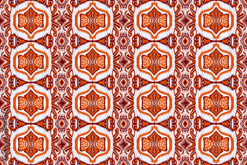 Ikat floral paisley embroidery on brown  orange white background