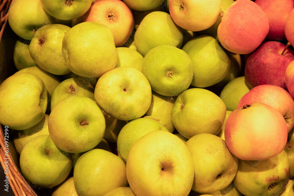 Apples in wicker baskets in supermarket, top view Apples in wicker baskets in supermarket, top view