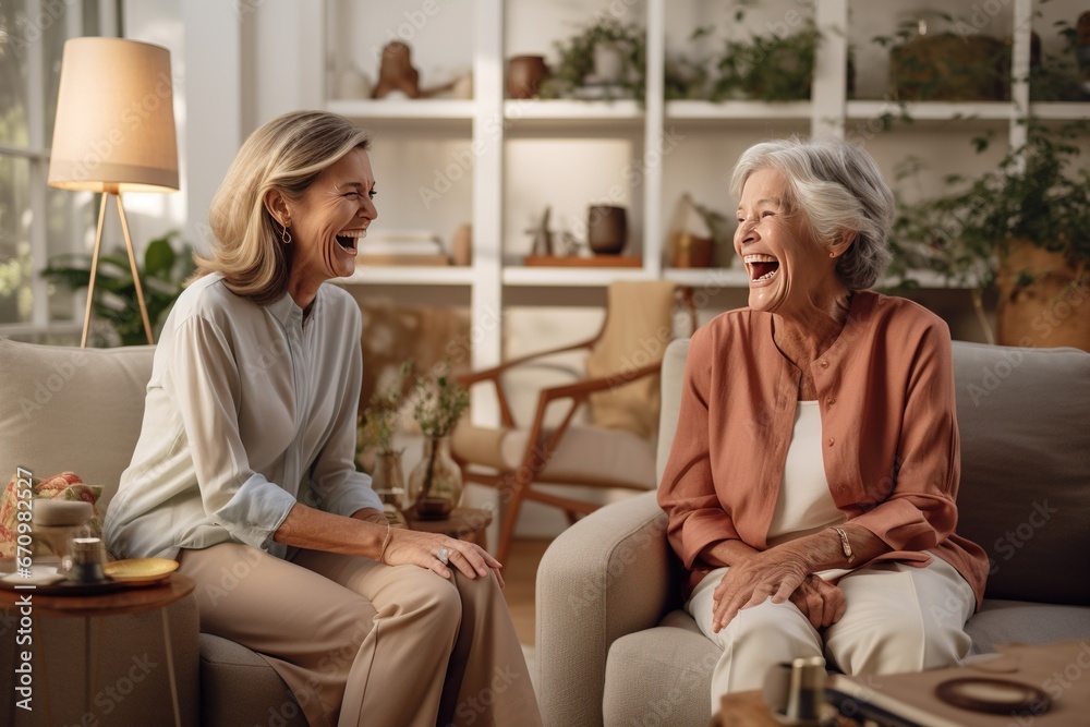 The senior Woman smiles and talks with a friend on sofa in the living room,Comfortable Talks: Elderly Friendship The senior Woman smiles and talks with a friend on sofa in the living room,Comfortable Talks: Elderly Friendship