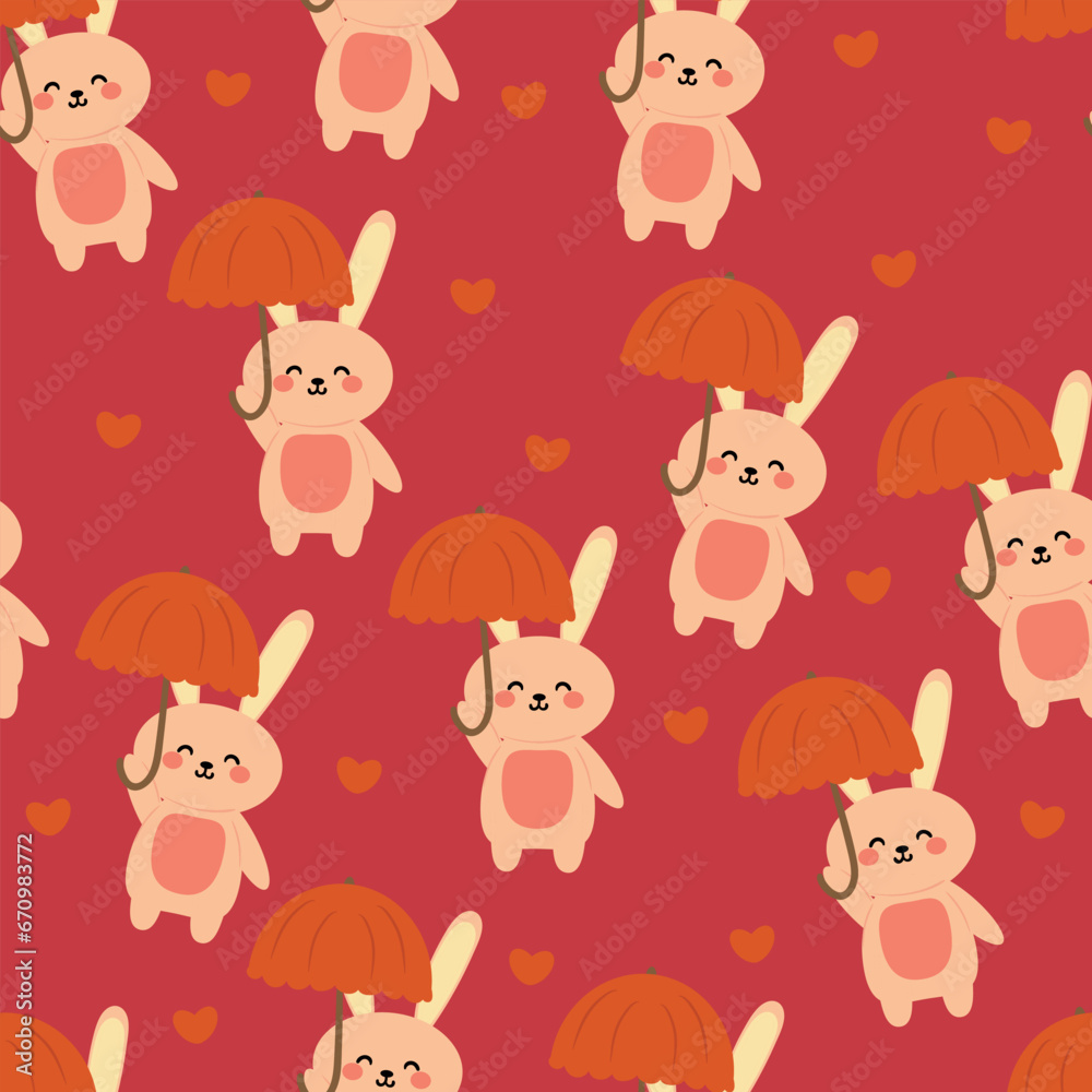 Cute rabbit wearing an umbrella cartoon seamless pattern. cute animal wallpaper illustrations for gift wrapping paper Cute rabbit wearing an umbrella cartoon seamless pattern. cute animal wallpaper illustrations for gift wrapping paper
