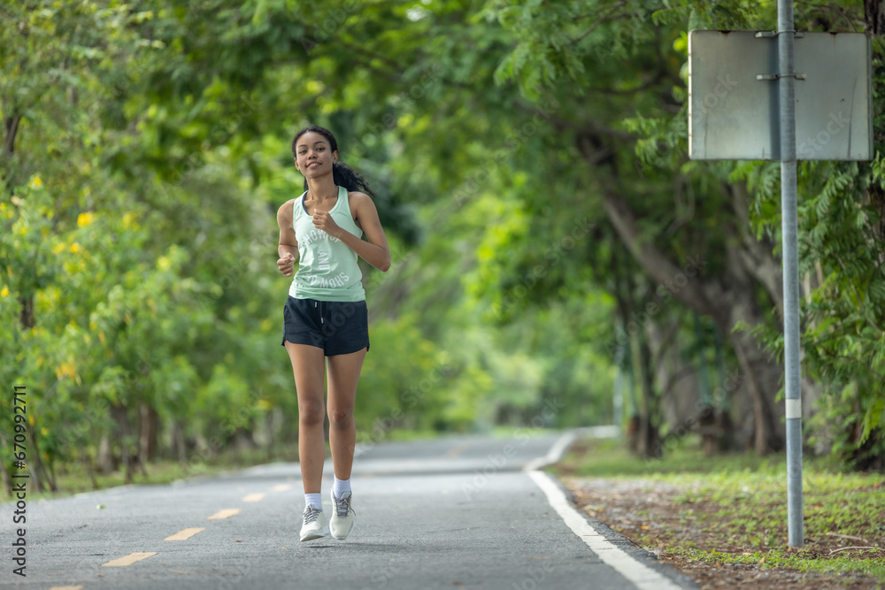 Stylish female runners in modern attire, discover serenity. Reenergize amid jogging the parkway. Stylish female runners in modern attire, discover serenity. Reenergize amid jogging the parkway.