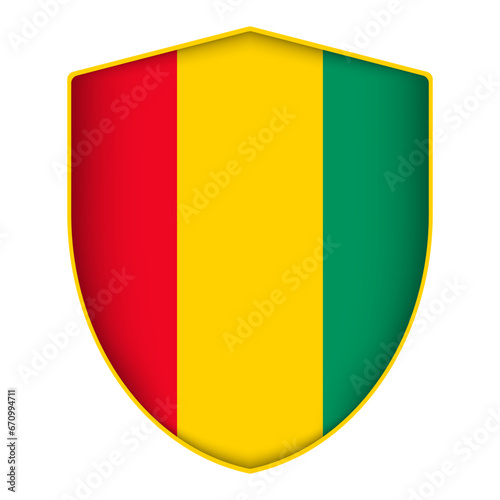 Guinea flag in shield shape. Vector illustration.
