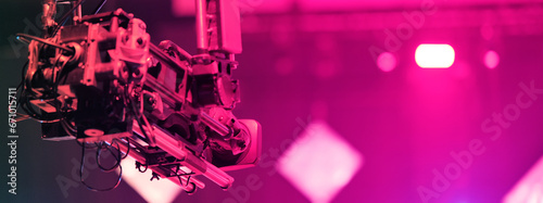TV camera on a crane at a football match or concert. Close-up live video broadcast camera