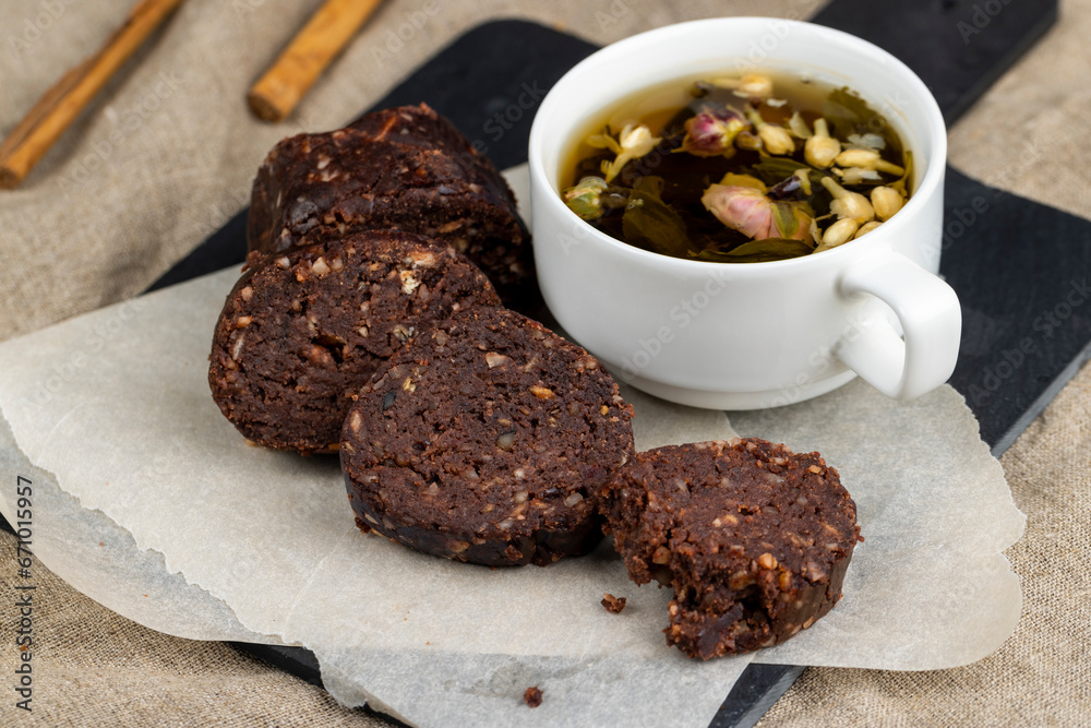 chocolate mass made from butter with the addition of cocoa and peanuts with cookies