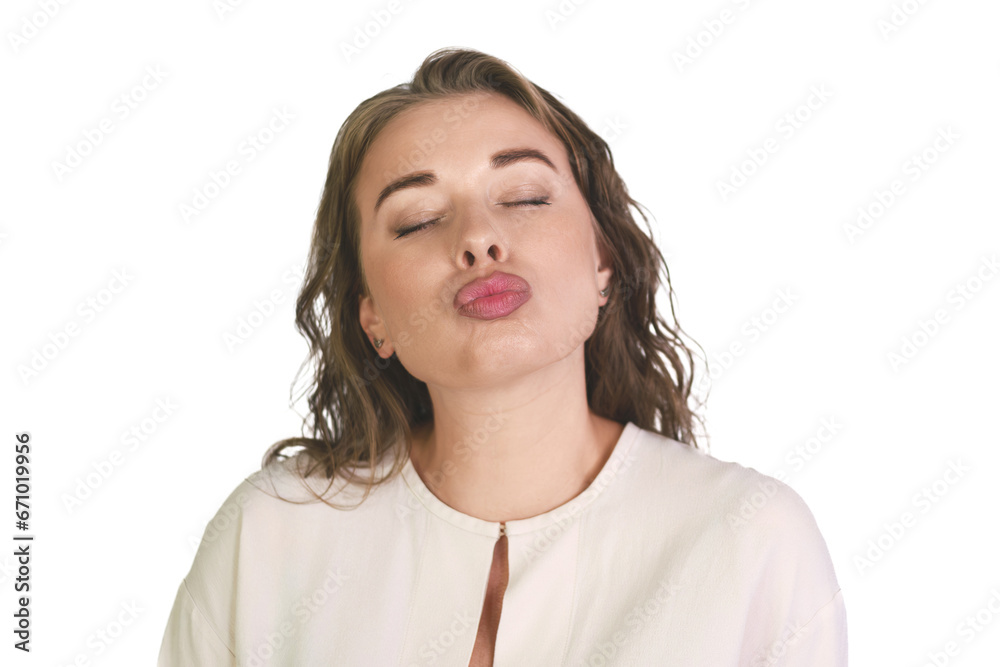 The girl comically depicts a kiss. Isolate on white background The girl comically depicts a kiss. Isolate on white background